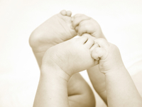 Hände und Füße eines Babys