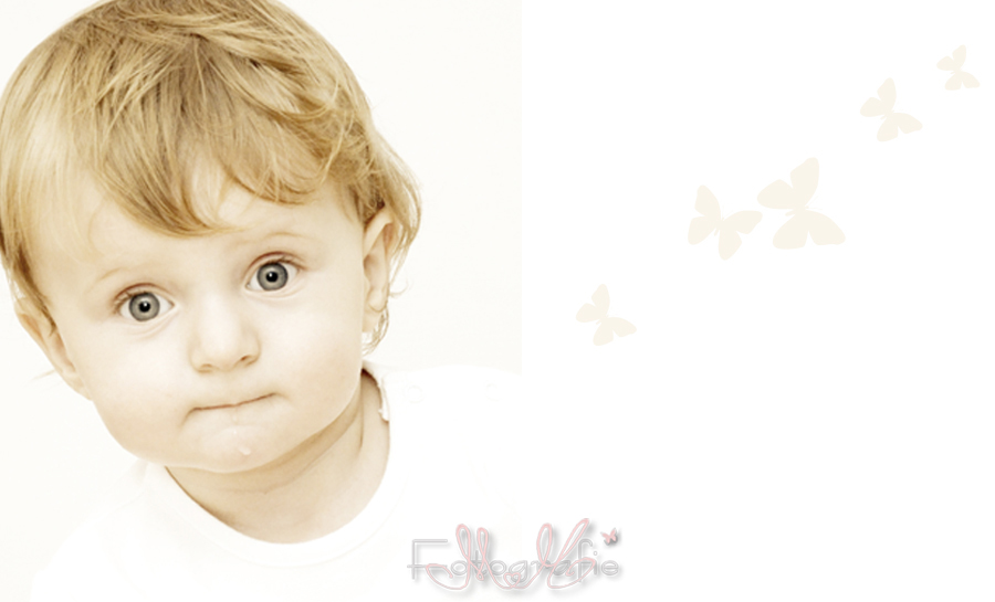 Baby-Fotografie. Fotografie eines kleinen nachdenklichen Kindes, mit großen blauen Augen, Portrait.