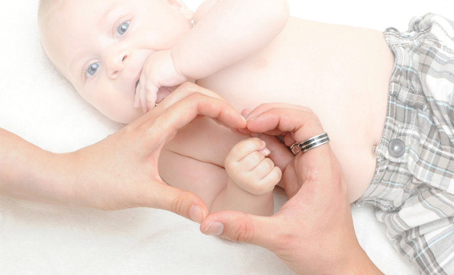 Babyfoto Herz mit Händen